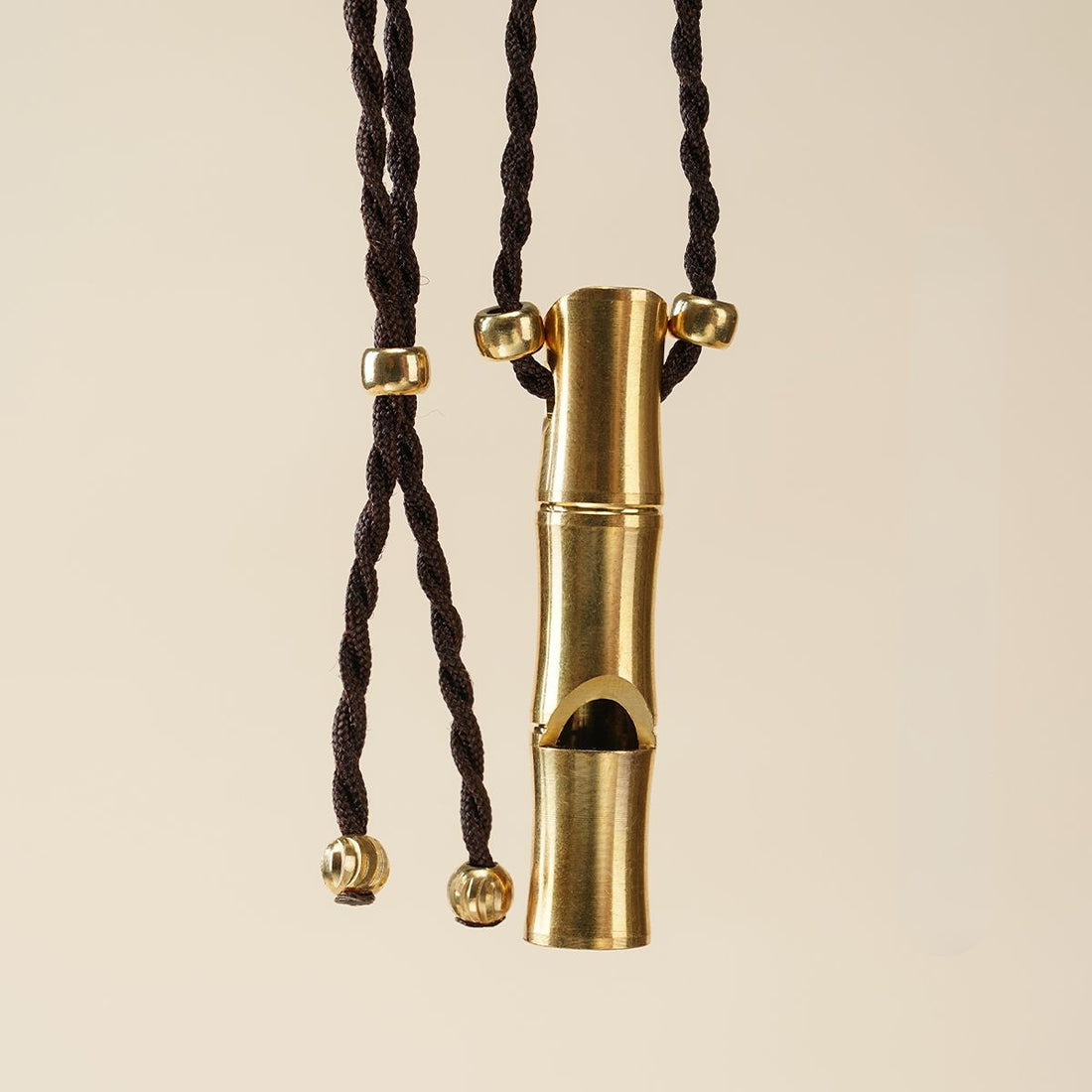 Brass whistle pendant